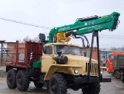 Лесовозный тягач Урал с ГМ Атлант-90    